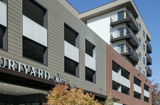 Exterior of a Courtyard by Marriott hotel with balconies