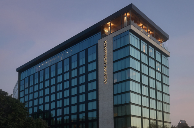 Exterior of the Kimpton Santo hotel at dusk