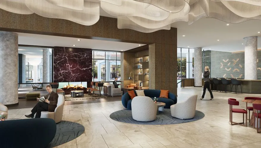Rendering of the Hyatt Regency lobby with lounge seating and a fireplace
