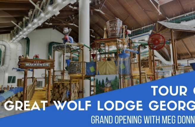 Indoor water park with text "Tour Great Wolf Lodge Georgia – Grand Opening with Meg Donn..."