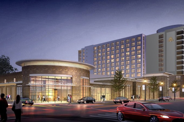 Rendering of the Alpharetta Conference Center and adjoining hotel tower at night