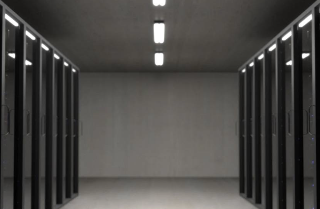 Empty server room corridor lined with black equipment racks