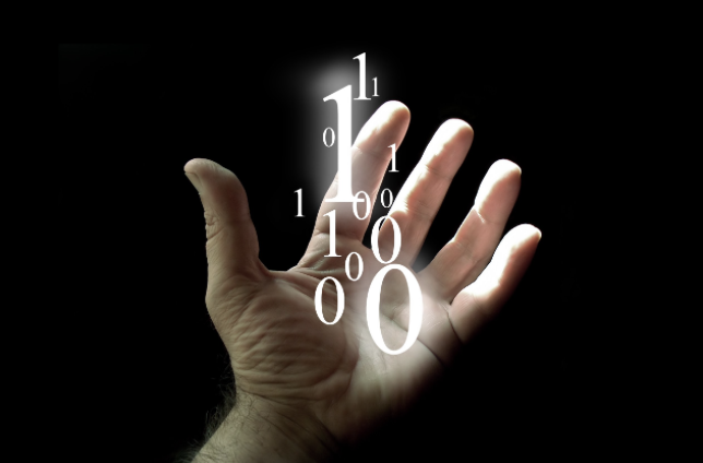 Open hand with glowing binary digits rising from the palm