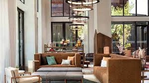 Lobby lounge with leather sofas and chandeliers at Canopy by Hilton Scottsdale